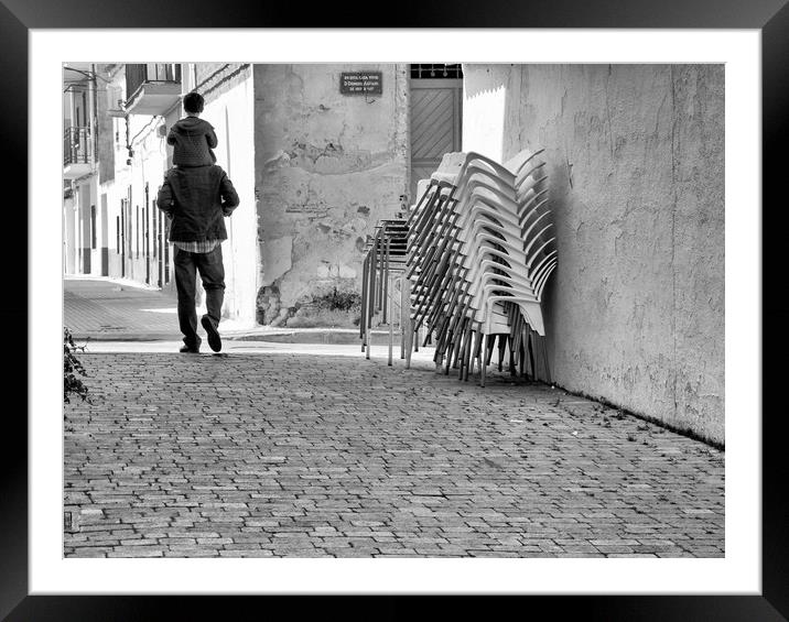 Man and child in old district of town Framed Mounted Print by Igor Krylov