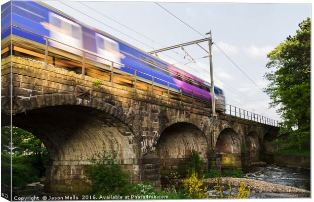 Transpennine Express train over the arches Canvas Print by Jason Wells