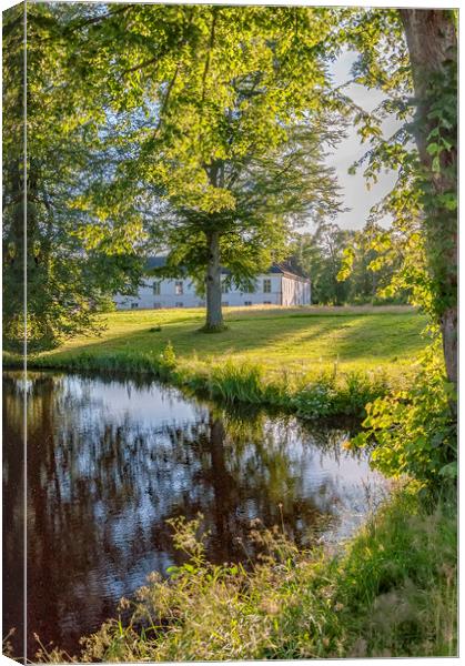Herrevads Kloster By The Riverside Canvas Print by Antony McAulay