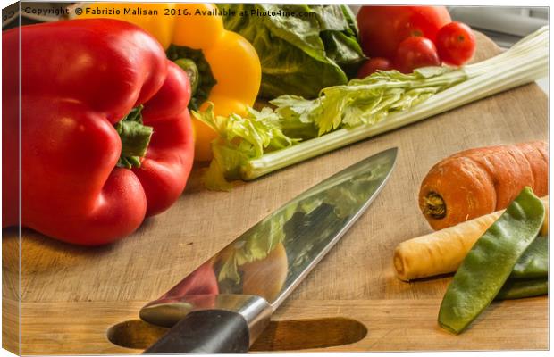 Vegetables on chopping board Canvas Print by Fabrizio Malisan