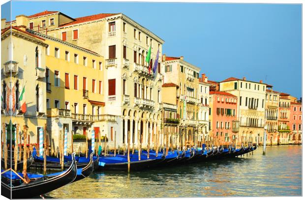     Venice Gondolas.                               Canvas Print by Michael Oakes