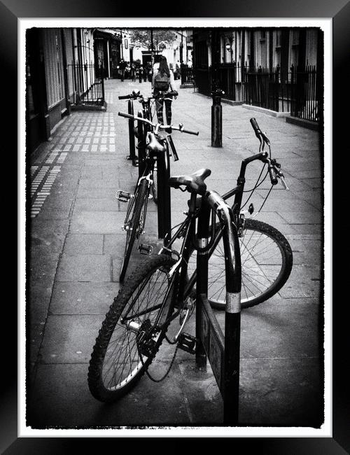Bicycles in a London Street Framed Print by Lynn Bolt