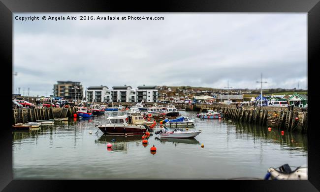 Westbay Harbour Framed Print by Angela Aird