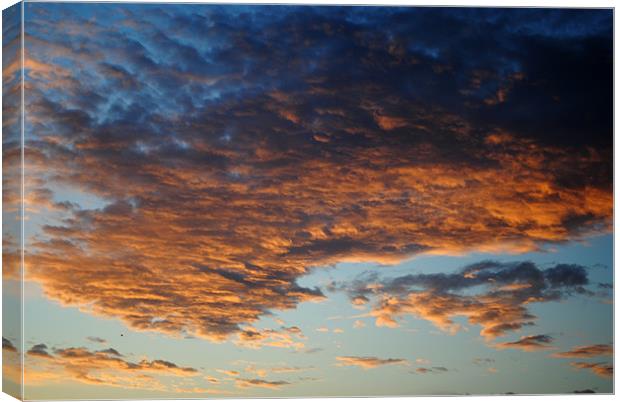 Clouds at Dawn Canvas Print by graham young