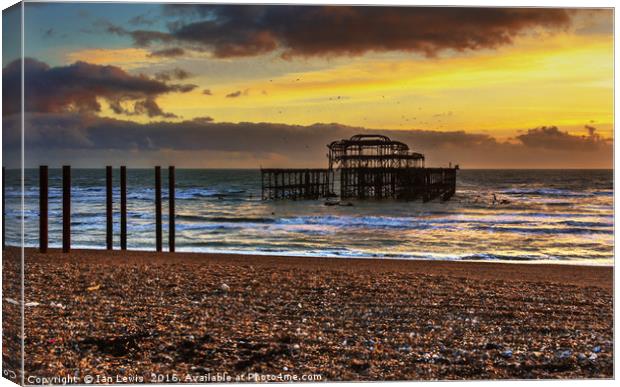 Sunset of the Pier Canvas Print by Ian Lewis