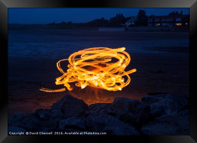 Dancing With Fire  Framed Print by David Chennell