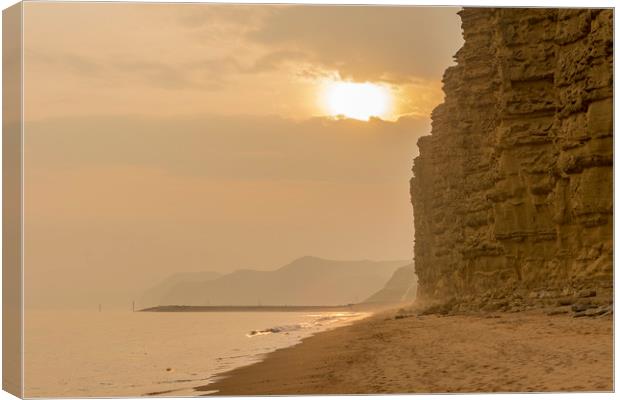 Jurassic Sunset at sultry West Bay Canvas Print by Malcolm McHugh