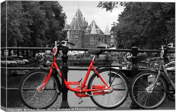 Red Bicycle By The Canal  Canvas Print by Aidan Moran