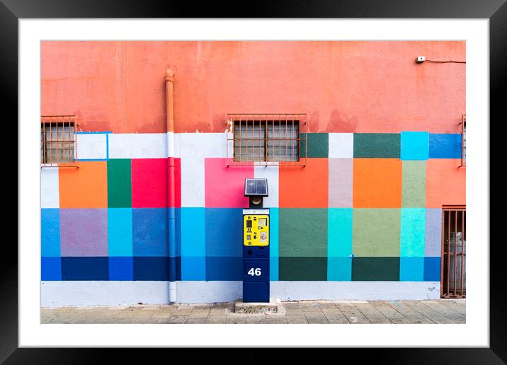 Painted wall and parking meter Framed Mounted Print by Gail Johnson