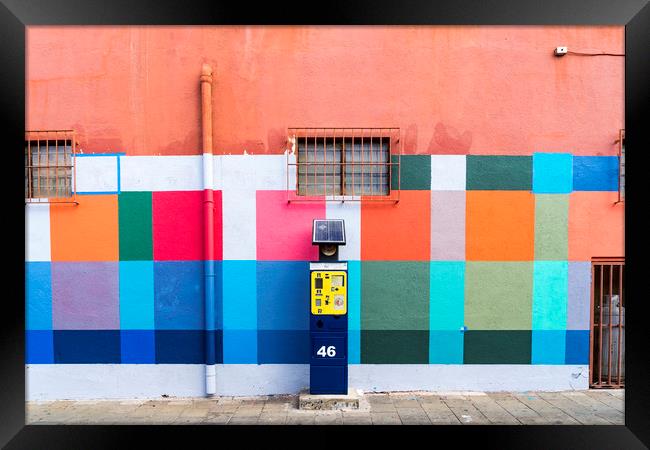 Painted wall and parking meter Framed Print by Gail Johnson