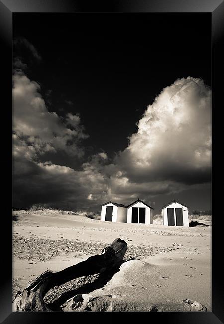 Three beach huts Framed Print by Simon Wrigglesworth