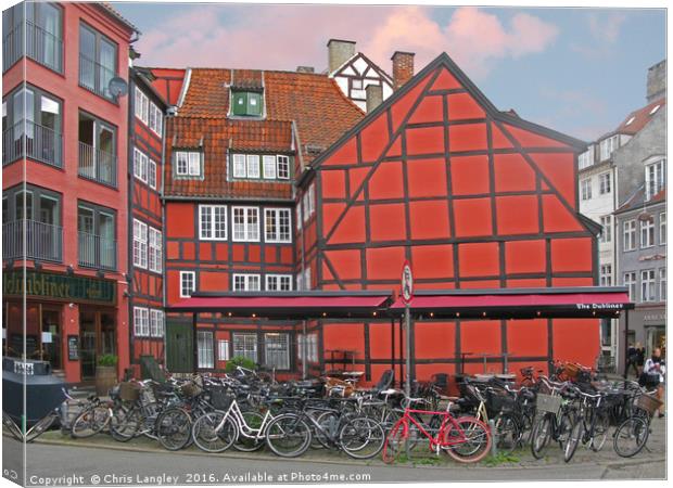 The Red Bicycle, Copenhagen, Denmark Canvas Print by Chris Langley