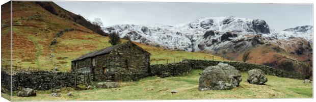 Stone barn and snow capped mountains. Hartsop, Cum Canvas Print by Liam Grant