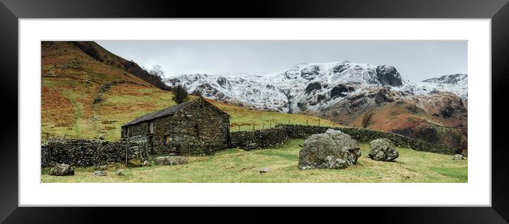 Stone barn and snow capped mountains. Hartsop, Cum Framed Mounted Print by Liam Grant