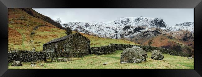 Stone barn and snow capped mountains. Hartsop, Cum Framed Print by Liam Grant
