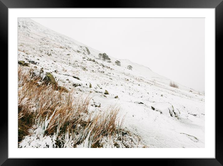 Heavy snow falling on a mountainside. Cumbria, UK. Framed Mounted Print by Liam Grant