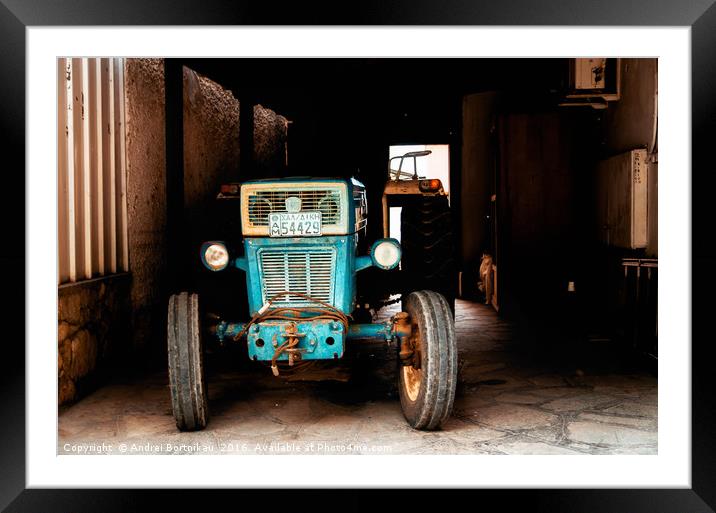 Greek tractor in the garage, Halkidiki Framed Mounted Print by Andrei Bortnikau