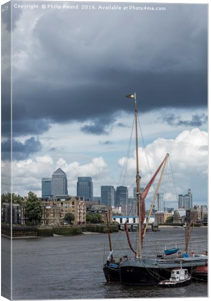 Thames Barge & Canary Wharf Canvas Print by Philip Pound
