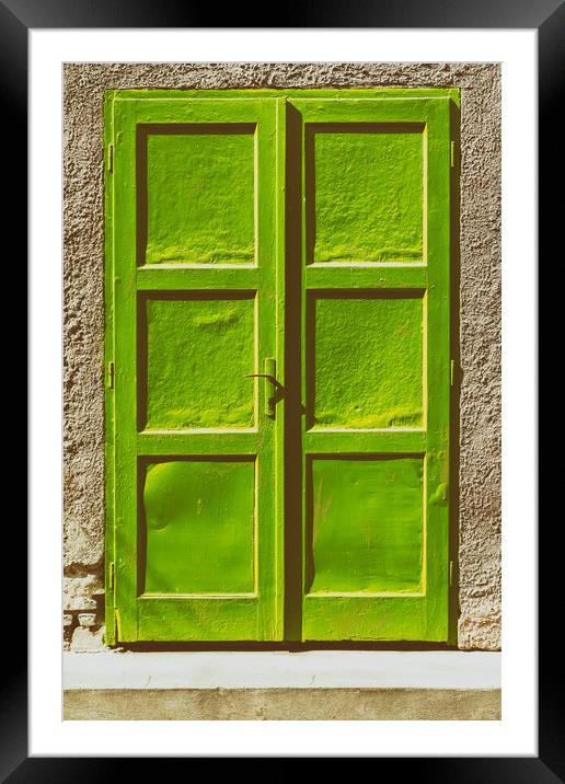 Green Door On Concrete Wall Framed Mounted Print by Radu Bercan