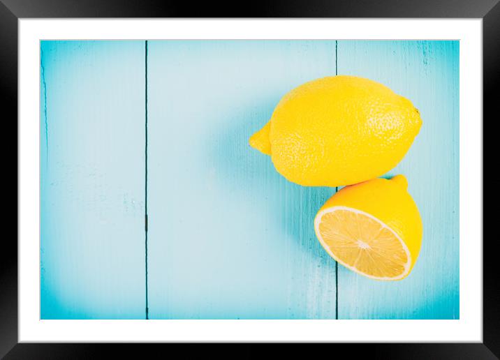 Fresh Yellow Lemons On Wooden Table Framed Mounted Print by Radu Bercan