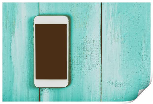 White Mobile Phone With Blank Screen On Wood Table Print by Radu Bercan