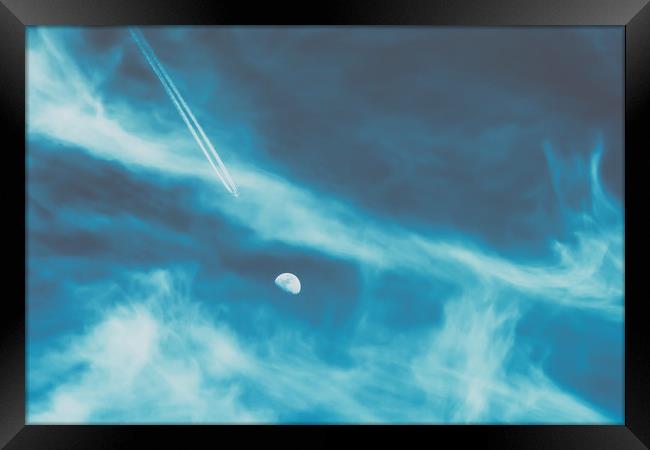 Airplane Flying To The Moon Concept On Blue Sky Framed Print by Radu Bercan