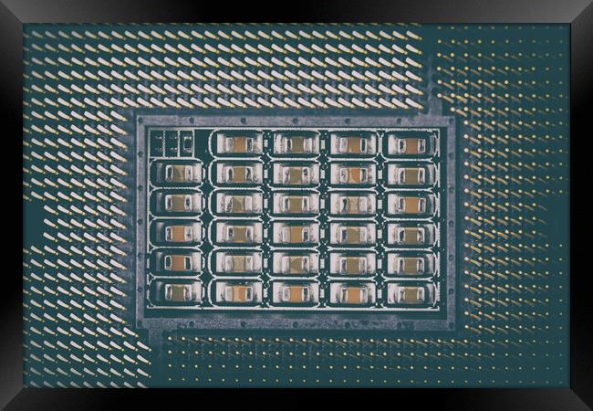 CPU Socket On Computer Motherboard Framed Print by Radu Bercan