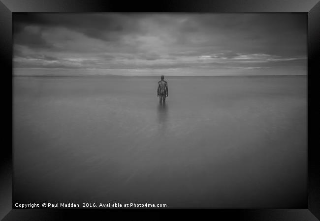 The Iron Man in the sea Framed Print by Paul Madden