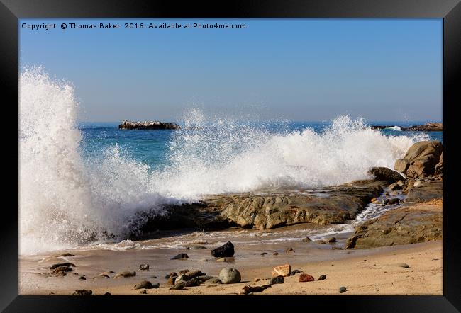Ocean waves hitting rocks on Laguna Beach in Calif Framed Print by Thomas Baker