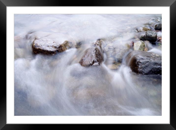 River water flowing between rocks. Cumbria, UK. Framed Mounted Print by Liam Grant
