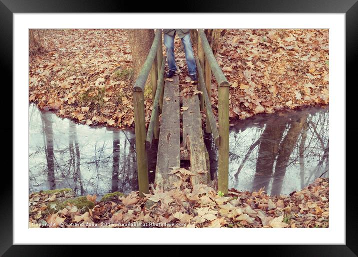 man standing on an old footbridge Framed Mounted Print by saturno dona