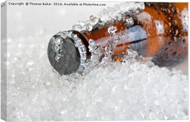 Close up view of an ice cold beer bottle neck and  Canvas Print by Thomas Baker