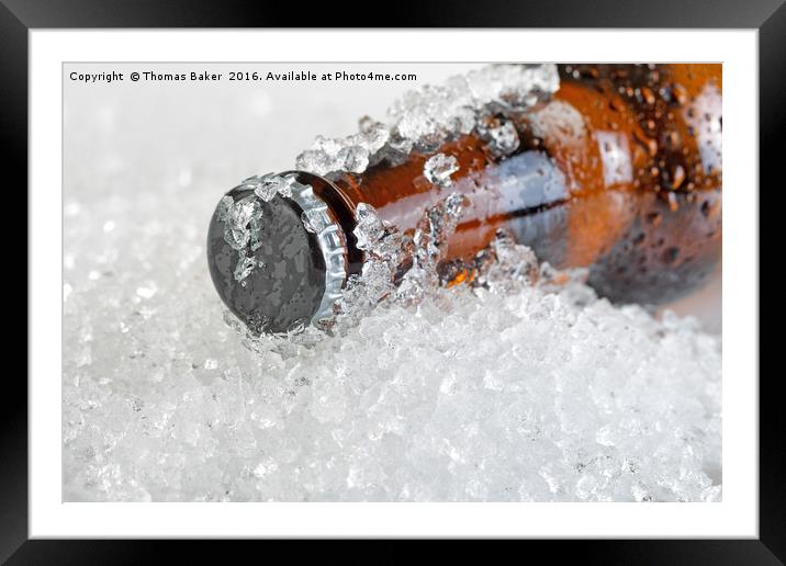 Close up view of an ice cold beer bottle neck and  Framed Mounted Print by Thomas Baker