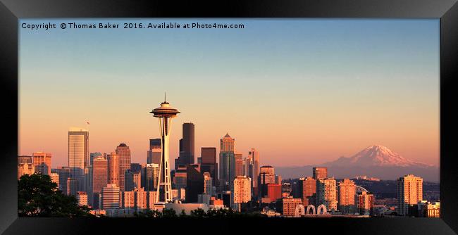 Sunset over the city of Seattle Washington during  Framed Print by Thomas Baker