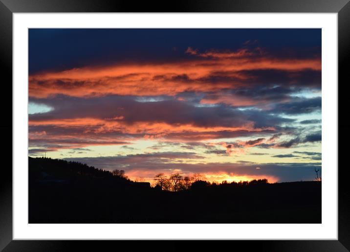 sunset behind wild clouds Framed Mounted Print by Tanya Lowery