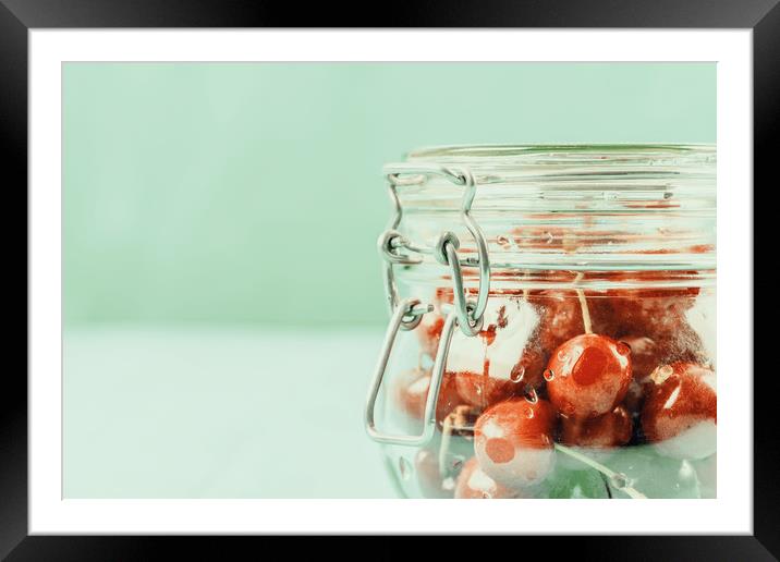 Jar Of Red Fresh Cherries Framed Mounted Print by Radu Bercan
