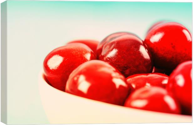 White Bowl Of Fresh Red Cherries Canvas Print by Radu Bercan