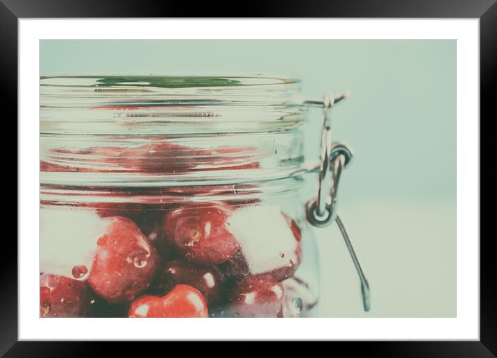 Jar Of Red Fresh Cherries Framed Mounted Print by Radu Bercan