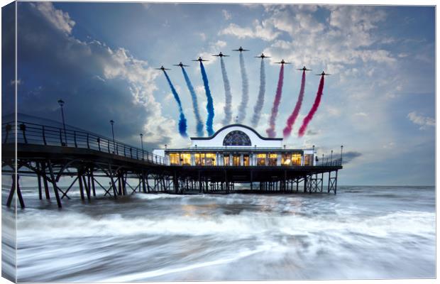 Reds Over The Pier Canvas Print by J Biggadike
