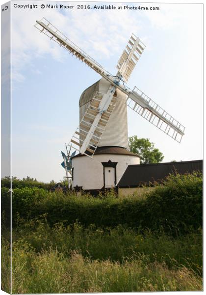 Saxtead mill on sunny day with hedgerow Canvas Print by Mark Roper