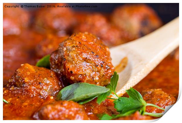 Freshly cooked meatballs in red sauce  Print by Thomas Baker