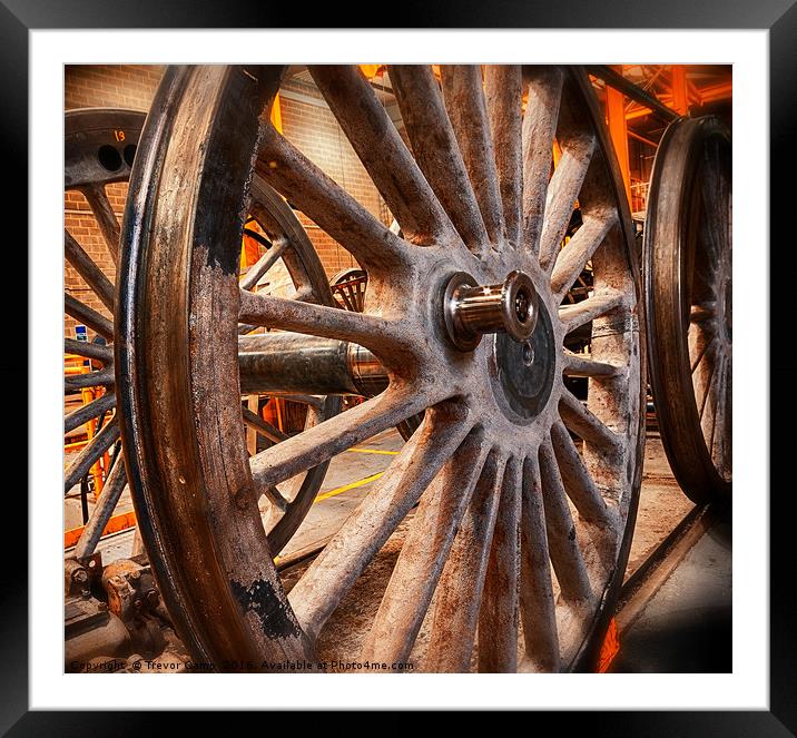 The Wheels Framed Mounted Print by Trevor Camp