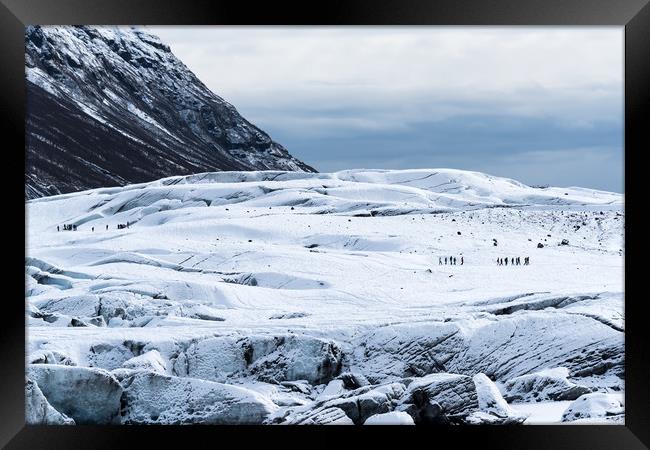 Walking on Glacier Framed Print by Svetlana Sewell