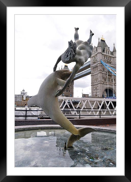 Women jumping over Dolphin Framed Mounted Print by Vishal Arvinda