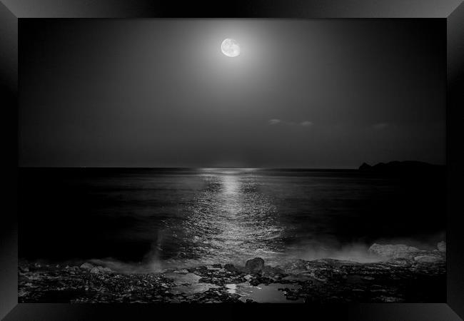 Moon on the sea Framed Print by Ray Hill