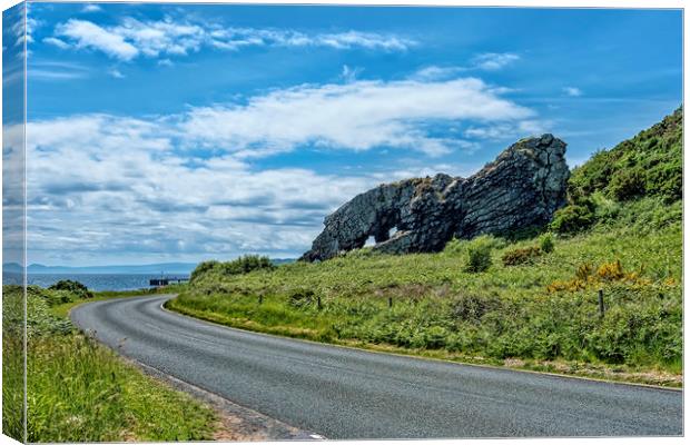 Lion Rock Millport Canvas Print by Valerie Paterson