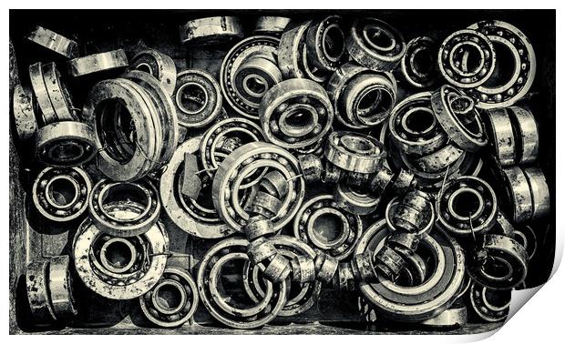 Pile of Old Rusty Ball Bearing Wheels Print by John Williams