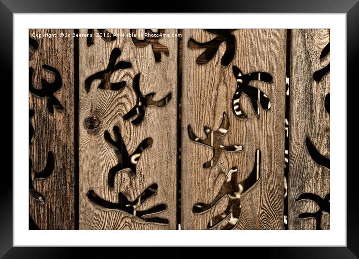 wooden swallows Framed Mounted Print by Jo Beerens