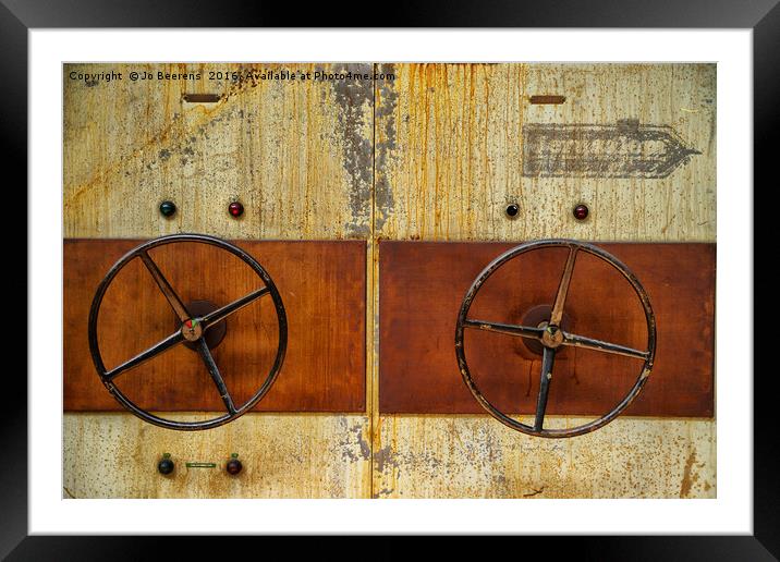 rusty wheels Framed Mounted Print by Jo Beerens