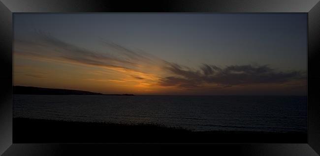 A coastal sunset Framed Print by Dan Thorogood